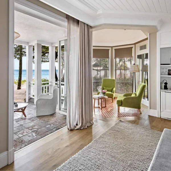 junior beachfront suite with terrace overlooking the blue ocean at heritage le telfair