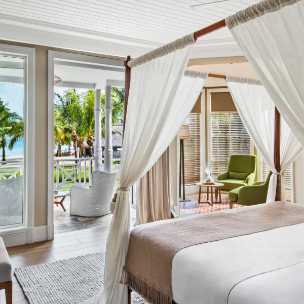 junior bedroom on upper floor with garden view and private balcony