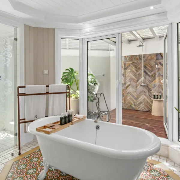 junior suite with garden view on ground floor with luxury style bathroom and outdoor showe