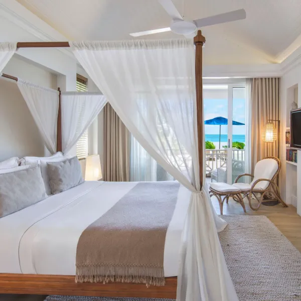 ocean beachfront suite bedroom beach access at heritage le telfair