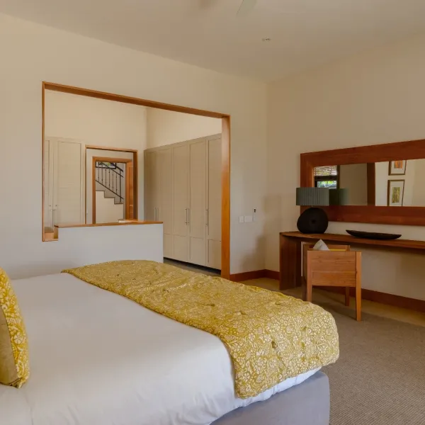 villa baume bedroom with king size bed and poolview at heritage the villas