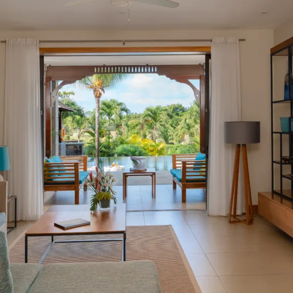 villa baume dining area with pool view 