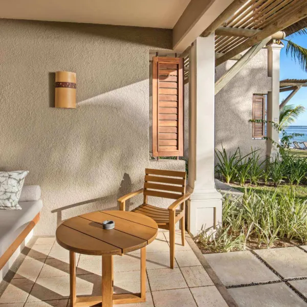 beachfront room terrace with direct access to beach heritage awali hotel