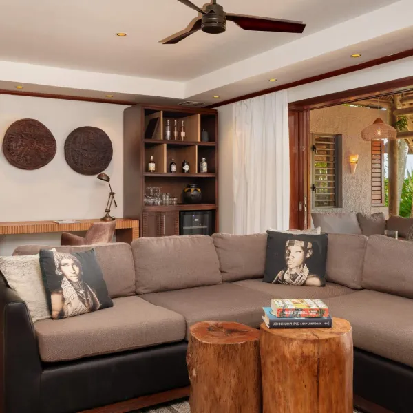 beachfront villa inspired african decor living room with stunning pool view