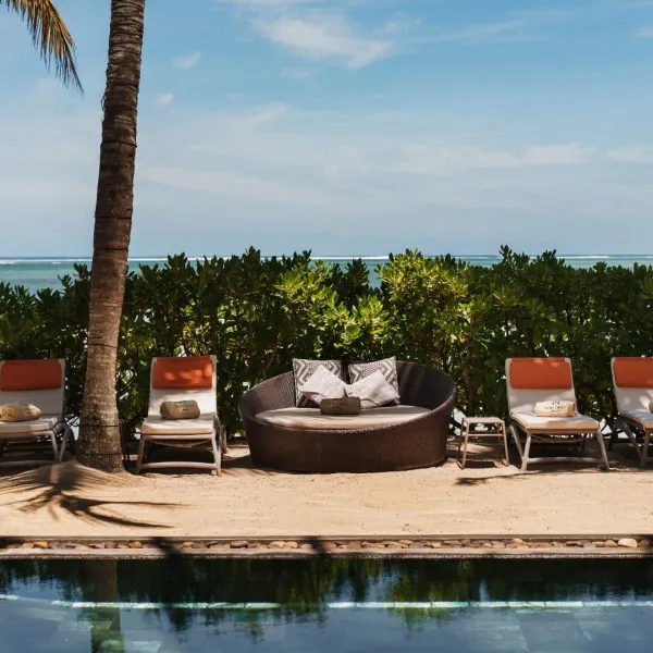 beachfront villa with spacious outdoor pool overlooking the ocean