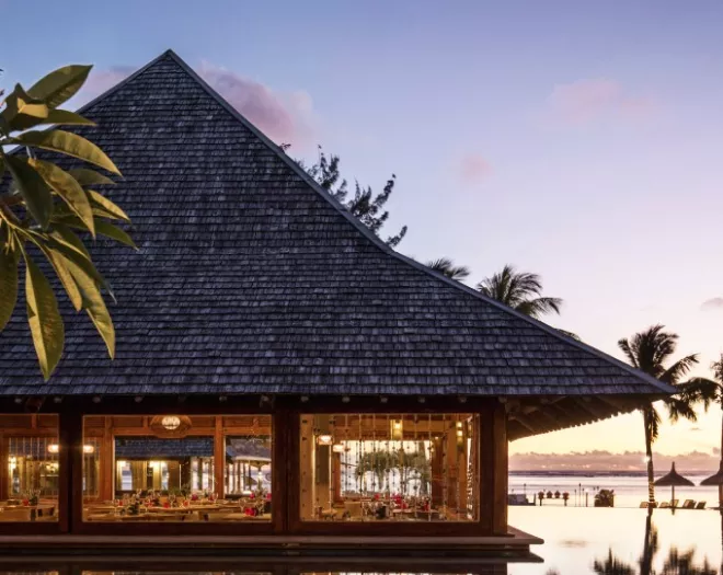 elegant beachfront pavilion at sunset and a tranquil reflections
