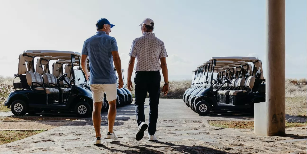 Golfers walking towards the course for an early tee time in Mauritius