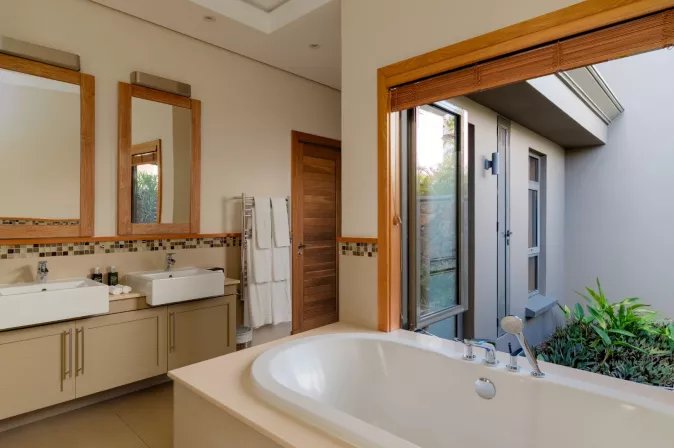 villa baume bathroom with outdoor view 