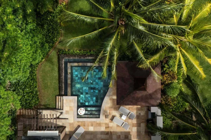 Pool area with garden view at Heritage The Villas Mauritius